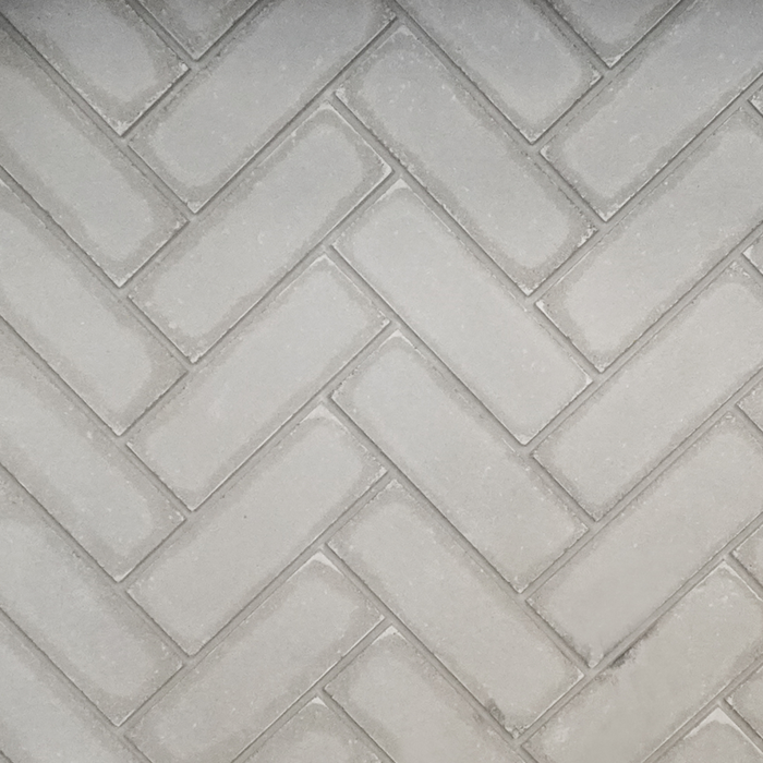 Empire herringbone brick liner swatch, gray