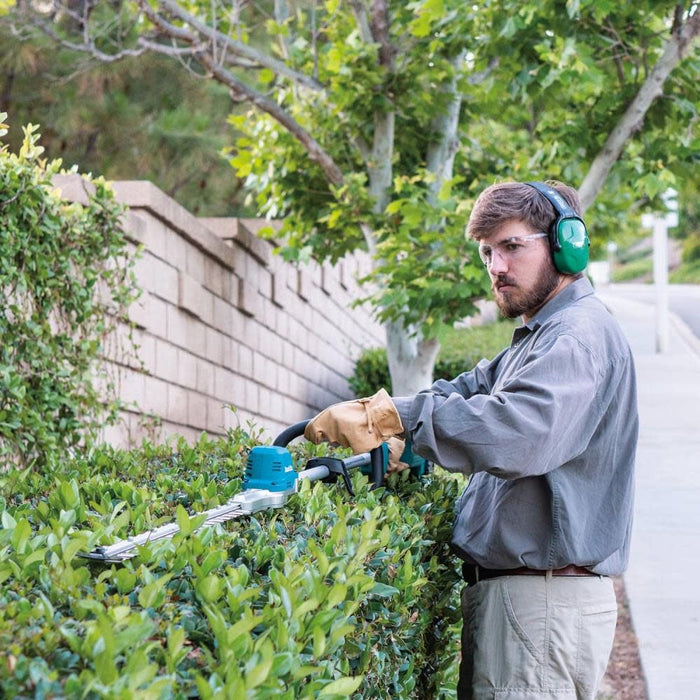VM Hardware Makita XNU02T 18V LXT® Lithium-Ion Brushless Cordless 24" Pole Hedge Trimmer Kit (5.0Ah) - Lifestyle View