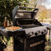 Monument Grills Mesa 325 | Black Propane Gas Grill 3 Burner Grill - Lifestyle View