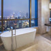 Modern Cascada Freestanding White Soaking Bathtub with Stainless Steel Drain and Overflow - Side View