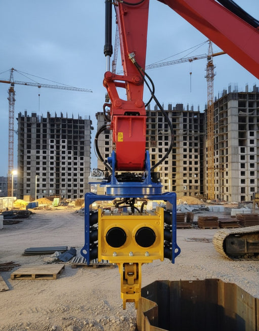 RAMEX auto-tilting vibro hammer mounted on an excavator, front view
