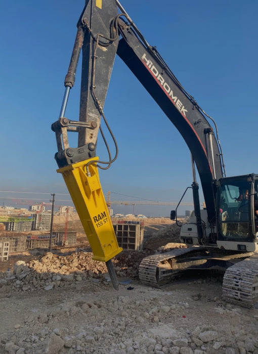 RAMEX RAM hydraulic breaker on an excavator, front view, representative photo
