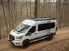 Flatline 2015-2025 Ford Transit 148" Mid Roof Low Pro Roof Rack With Light Bar Fairing – installed on vehicle, image 3 of 13