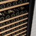 Close-up of bottles stacked on the shelves of the Empava EMPV-WC15S wine cooler